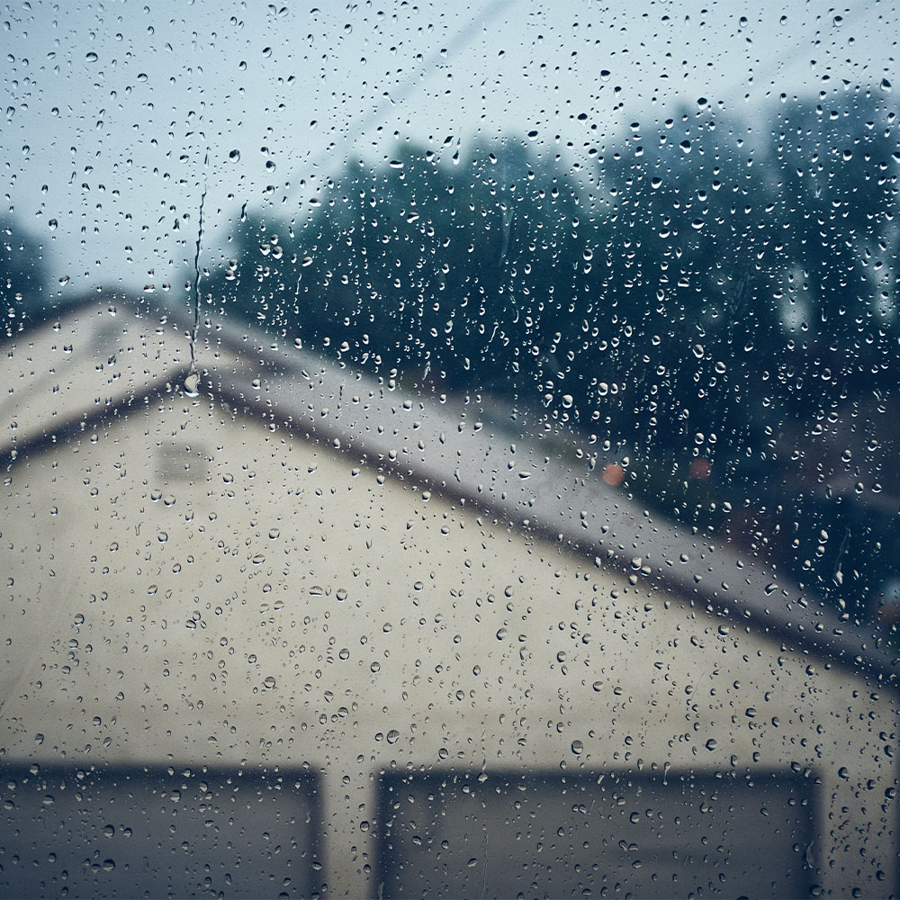 Heavy Rain in Open Metal Garage E